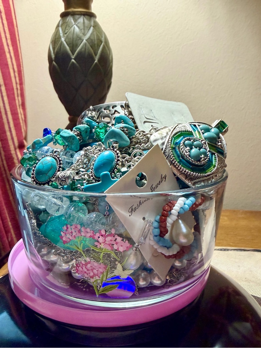 Dolly Parton bowl full of mystery jewelry